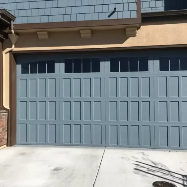 Blue-gray carriage-style garage door